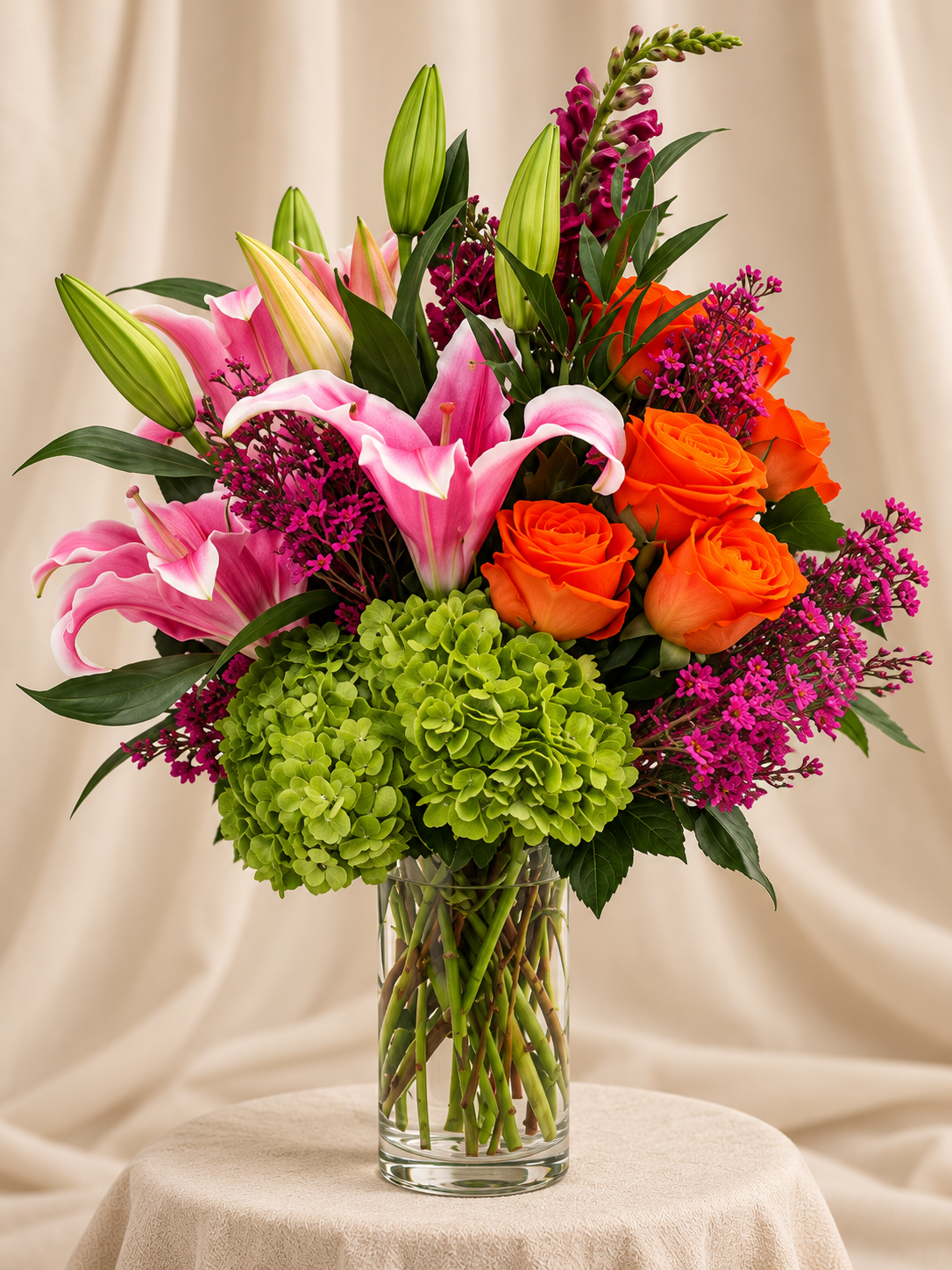 Pink lilies + orange roses + green hydrangea