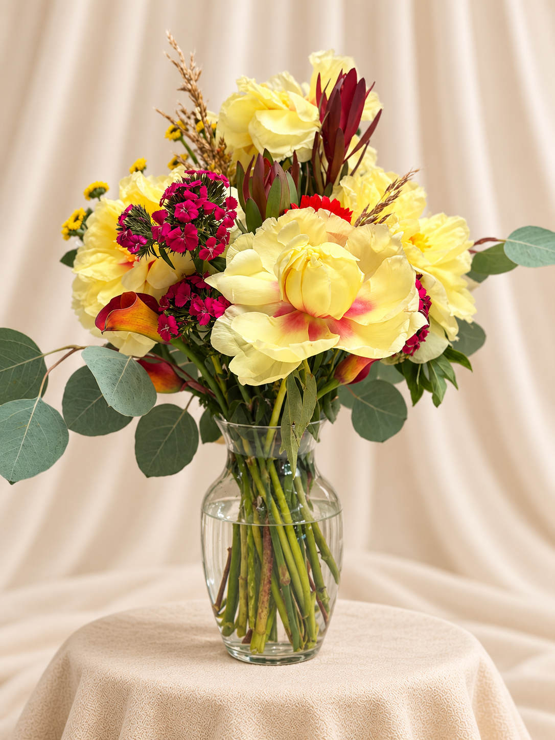 Yellow peony-style blooms + eucalyptus